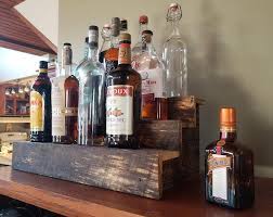Liquor Dispenser With Rustic Wood Base Reclaimed Farm Wood Etsy Wine Bottle Display Liquor Shelf Bottle Display