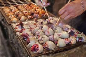 Making Takoyaki Grilled Savory Pancake Bites With Octopus Recipe Takoyaki Food Japanese Street Food