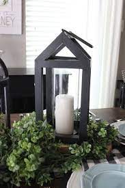 Black Wooden Lanterns Make For The Perfect Dining Table Centerpieces Inspo Faith Football And Fairy Lantern Table Centerpieces Wooden Lanterns Lanterns Decor