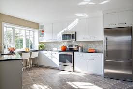 white cabinets and dark granite