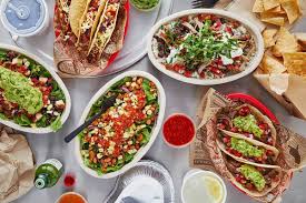 Burrito bowl, with steak or chicken, brown rice, black beans, fajita veggies, guacamole, and green salsa: Chipotle Rolls Out New Rewards Program Eater