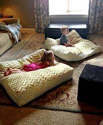 A floor pillow is a cushion or extra large pillow that is often used as extra seating or for added comfort when lounging on the floor. 13 Easy Diy Giant Floor Pillows Giant Floor Pillows Floor Pillows Pillows