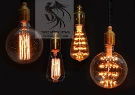How To Make An Interesting Art Piece Using Tree Branches Ehow Ampul Rustik Aydinlatmalar