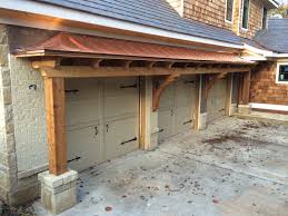 This Idea Different Execution Carriage Lights On Large Wooden Posts Stone Bases Garage Doors Garage Door Design Ranch House Exterior