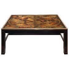 I only have one before picture and it's of nora, the matching end table: Vintage World Map Coffee Table By Maison Jansen At 1stdibs