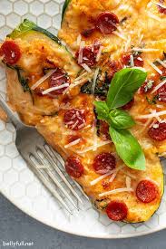 A zucchini boat is fresh zucchini which are sliced in half, the center hollowed. Pizza Stuffed Zucchini Boats Belly Full