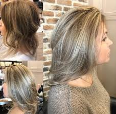 The look is lovely on curly locks as pictured here, as well as on smooth, straight styles. Natural Silver Blonde Gray Hair Highlights Grey Hair Coverage Blending Gray Hair