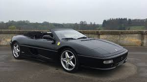 Finished in very classic rosso corsa red with tan interior black top and f1 transmission. 1999 Ferrari F355 Spider Review Retro Road Test Retro Motor