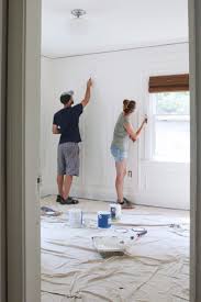 Today i am sharing a full tutorial on how to install modern wall molding in your own home. Diy How To Install Panel Moulding The Grit And Polish Wall Paneling Diy Diy Molding Wall Moulding