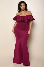 A Plus Size Mermaid Dress With An Off Shoulder Neckline And A Ruffled Trim Solid Colored All Over Curvy Dress Plus Size Fashion For Women Full Figure Fashion