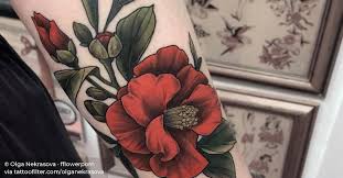 Fiery rounded flower clusters open a deep golden orange darkening into intense red at maturity all the while attracting bees, butterflies, and low flying hummingbirds. Red Camellia Flower