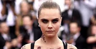 For her 14th piece of body art, cara delevingne had bacon inked onto her foot like tyra banks in lifesize. Cara Delevingne Showed Up To The Met Gala Covered In Tattoos Youbeauty