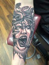 Red leather tattoo recliners and fire engine red stations are surrounded by tribal masks and other super swanky items. Medusa By Bryce At Tribe Tattoo In Denver Co Tattoos