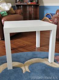 It looks as if it was made of wood, but actually it was treated with a few coats of paint and an acrylic finish, which gives it a natural look. Ikea Hack Ottoman Tutorial Infarrantly Creative