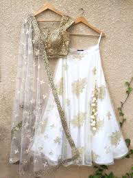 Ogaan is an online indian fashion store for women that offers exclusive women's clothing, designer jewellery & fashion accessories based on the latest designs for women. Gold Mirror Work White Lehenga Set Shrena Hirawat Indian Outfits Clothes For Women Indian Fashion Dresses
