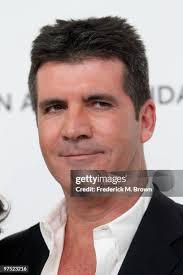 Singer Kris Allen and Katy O'Connell arrive at the 18th annual Elton...  News Photo