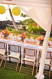 Pull Off A Hawaiian Luau Wedding Reception Anywhere With Ease Luau Wedding Luau Wedding Receptions Hawaiian Wedding Themes