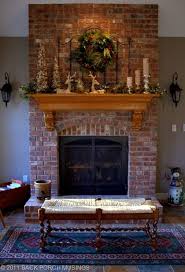 The look's been carried up and over the mantel shelf onto the entire wall which covers all the wall brick. Hearth Room Christmas Back Porch Musings Brick Fireplace Decor Red Brick Fireplaces Home Fireplace