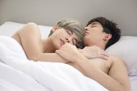 A male couple with an Asian man sleep together in a bed, a symbol of sexual  diversity, expressing openly gay men accepting LGBT concepts. 6783525 Stock  Photo at Vecteezy