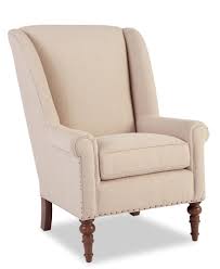 3 furnishings tan chair curved armrests and sides wood legs legs in the front are curved and detailed and dark s furniture accent chairs howell furniture