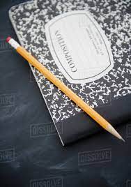 1 box of crayola markers. Close Up Of Composition Book And Pencil Stock Photo Dissolve
