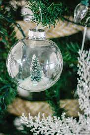 Diy Snow Globe Ornament Fill A Clear Ornament With A Bottle Brush Tree Clear Ornaments Globe Ornament Diy Snow Globe