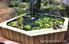 You shouldn't drain your hot tub on your lawn. 20 Beautiful Backyard Pond Ideas For All Budgets