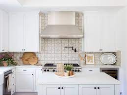 Tiled kitchen backsplashes give a custom look to a home and stand up better than a wallpapered backsplash according to an angie's list magazine report. 27 Kitchen Tile Backsplash Ideas We Love
