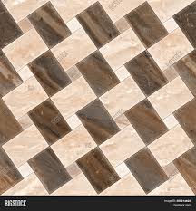 Bold, brightly colored tiles make up this geometric pattern that could play tricks on your eyes if you stare at it long enough. Floor Tiles Image Photo Free Trial Bigstock