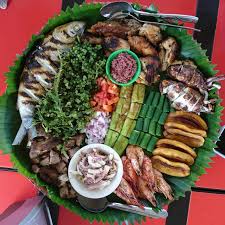 Birthday Food Ideas For Adults Filipino I Ate A Platter Of Grilled Meat Seafood And Veggies In Alaminos Pangasinan Party Food Platters Food Platters Filipino Street Food