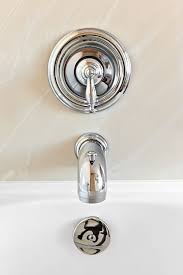How To Fix A Loose Faucet Like A Pro With Images Shower Repair Bathtub Faucet Replace Bathtub Faucet