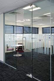 One transforms and enlightens workspaces with a minimalist profile, lightweight aluminum frame, and transparent glass. Frameless Glass Offices Google Search Glass Office Doors Frameless Glass Doors Glass Wall Design