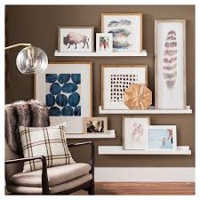 The strong, powder coated brackets attach the shelves to the wall firmly and are hidden behind the shelves. Ledge Wall Shelf Gallery Wall Target