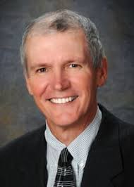 Dr. Tyler J. Lewandowski