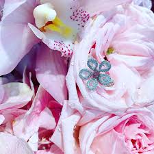 The copyright of the original artwork and all derivative images are retained solely by the artistist. A Sign Of Beauty A Symbol Of Grace Flower Into Jewellery Jewellery Into Flower Kahnhighjewellery Flower Jewelry Love Flower Jewellery Grace Symbol Symbols