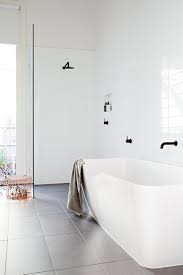 Grey Floors White Walls Chrome Fittings Chrome Shower Frame White Vanity In 2020 Modern White Bathroom White Bathroom Designs White Bathroom