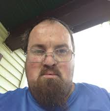 What is the name of the beach access with showers and changing area near  Oak Island?