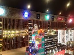 Wood Racking With Lighting Total Spotlight Mahogany Display Is Highlighted With Centerpiece Lighting Wine Storage Wine Display Wine Cellar Design