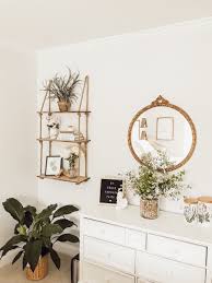 Antique Gold Round Mirror White Minimalist Dresser Boho Rope And Wood Shelves Room Inspiration Boho Style Room Room Ideas Bedroom