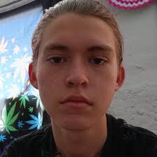 Who specializes in black and white horror tattoos?