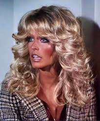 I am actually a pretty big fan of the original Charlie's Angels. I just  noticed that there's a Dolly Parton doll, too. I also think Farrah looks  more like Tammy Wynette. 🤷