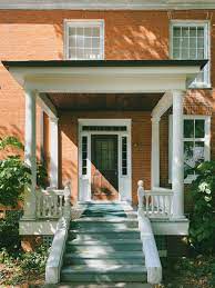 Michael will be making a decision on the front door and trim color soon. Brown Brick House With White Wooden Door Photo Free Ball S Falls Conservation Area Image On Unsplash