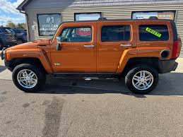 Image result for Sunburst Orange 2007 Hummer