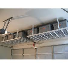If your garage isn't painted, you can easily identify stud locations by the vertical rows of nails or screws. Diy Garage Storage Overhead Storage 4x8 Overhead Garage Storage Garage Storage Diy Garage Storage