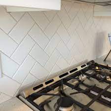 Maybe you would like to learn more about one of these? 3x6 White Subway Tile In A Herringbone Pattern With Light Gray Grout Kitchen Remodel 3x6 White Subway Tile White Subway Tile