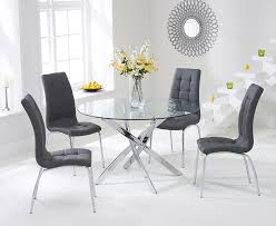 Round dark smoke glass tabletop extends with integrated laminate panel for seating 6. Denver 110cm Glass Dining Table With Calgary Chairs