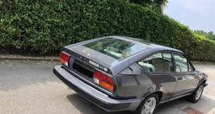 Image result for Gray 1984 Alfa-Romeo