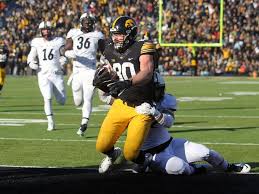 Brown Trophy Case Foreshadows Iowa S Smashing Success Iowa Iowa Hawkeye Iowa Hawkeyes