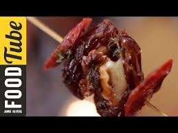Scoop the mixture into the prepared tin, spread level and scatter the remaining walnuts and demerara sugar over the top. Cheese Chorizo Stuffed Date Skewers Jamie Oliver Youtube Entertaining Recipes Jamie Oliver Recipes Food