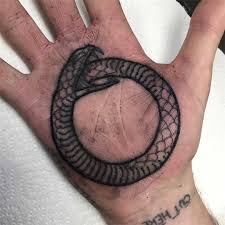 Wrist palm tattoo plans are popular because of their little size. Ouroboros Palm Tattoo By Luke A Ashley Tattoogrid Net